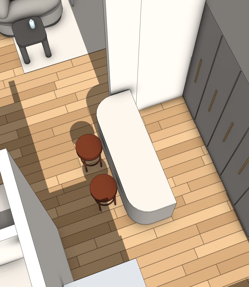 The kitchen with an island, two bar stools and a parquet floor